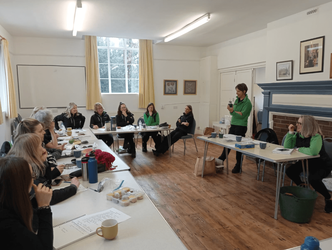 A training session around a table in a hall