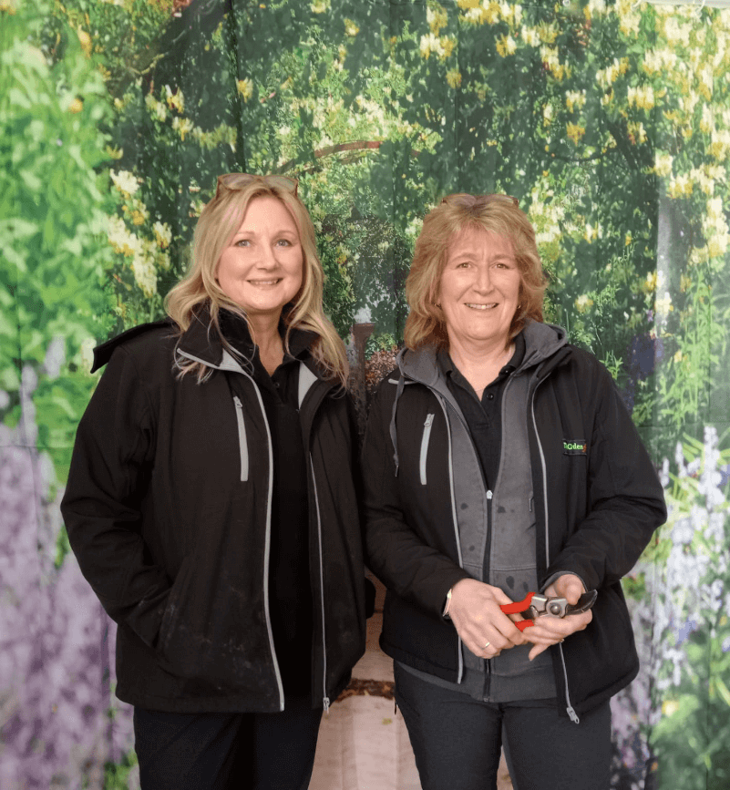 Two people standing for a photo